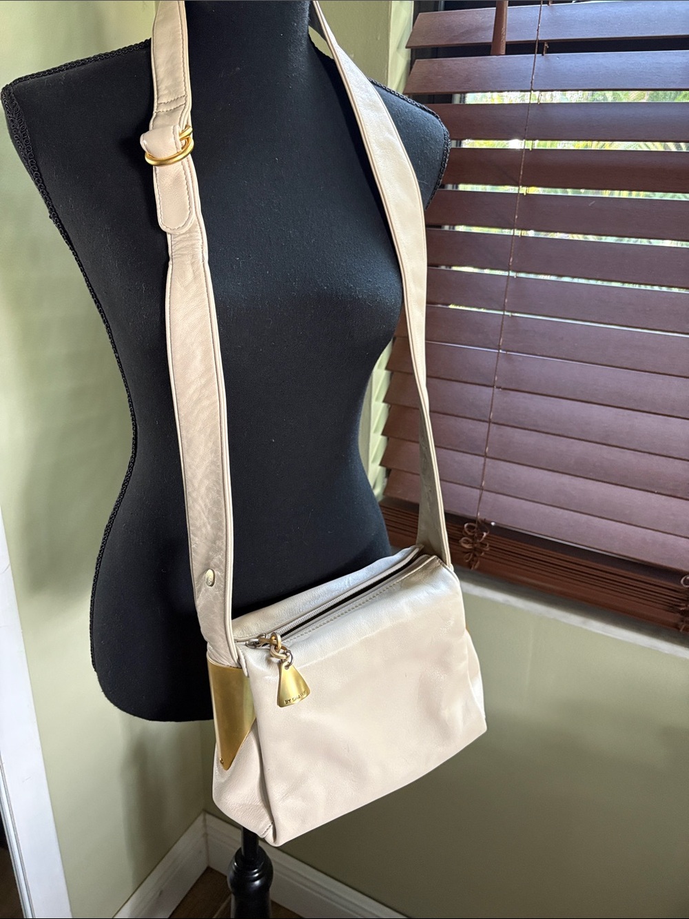 Buttery soft Sharif Cream Crossbody Bag with Gold Accents